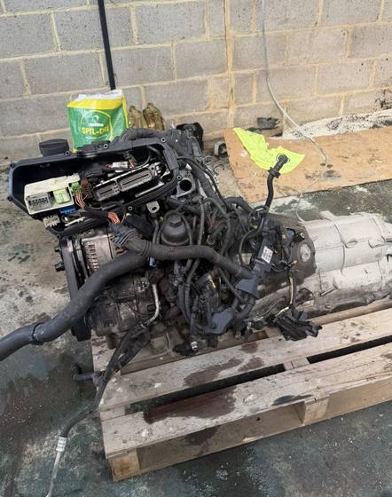 Engine and gearbox out of a vehicle ready for replacement